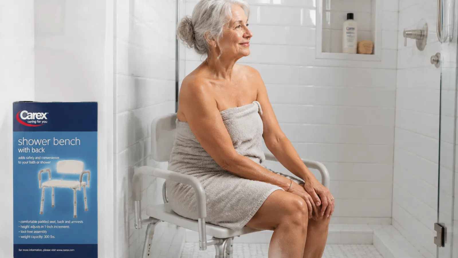 The Carex shower bench with padded arms and backrest shown from a slight angle inside a shower stall